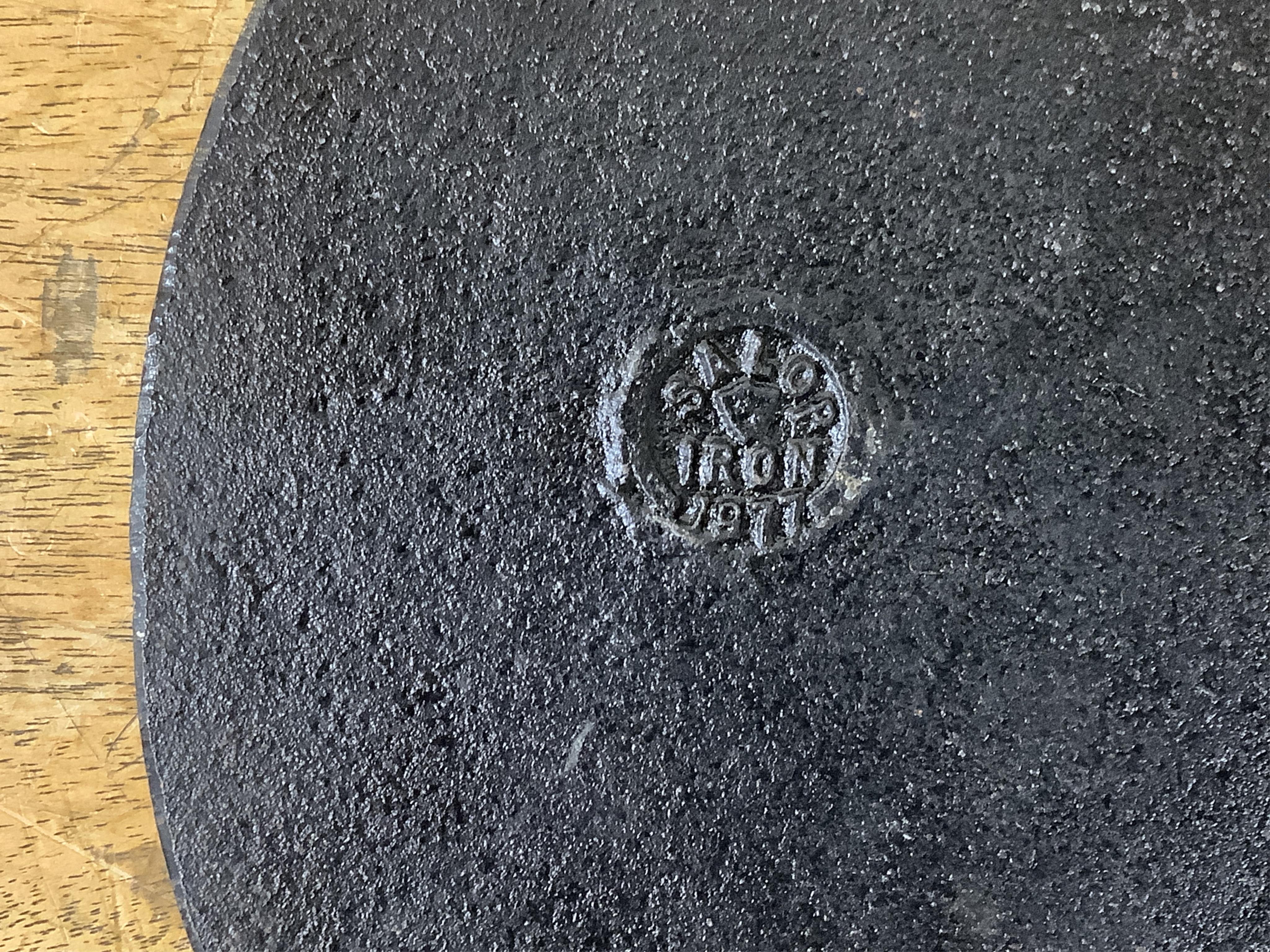 A reproduction Salop cast iron ‘The Iron Bridge 1779’ plaque together with a lead fire-mark, Salop Fire Office, latter 19cm high